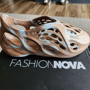 Lightweight foam slide sneakers.